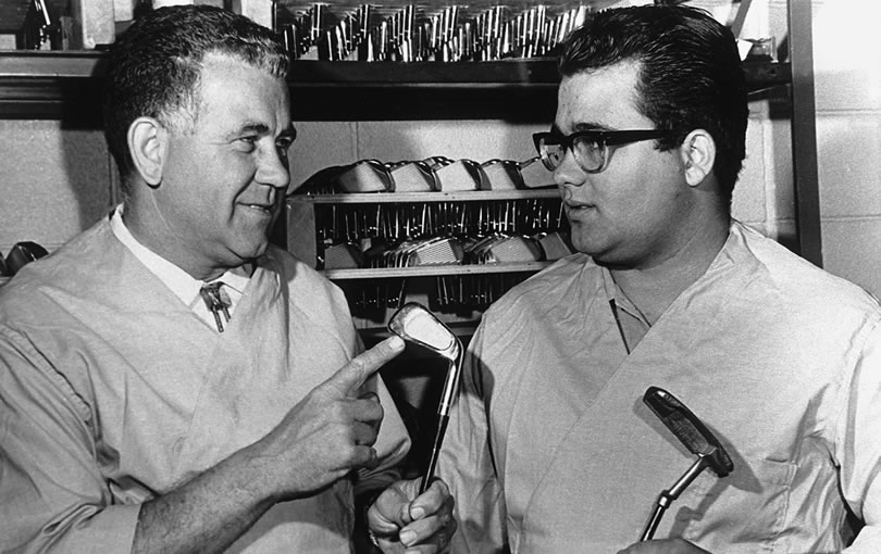 Karsten Solheim and John A Solheim holding the Anser iron and putter, respectively