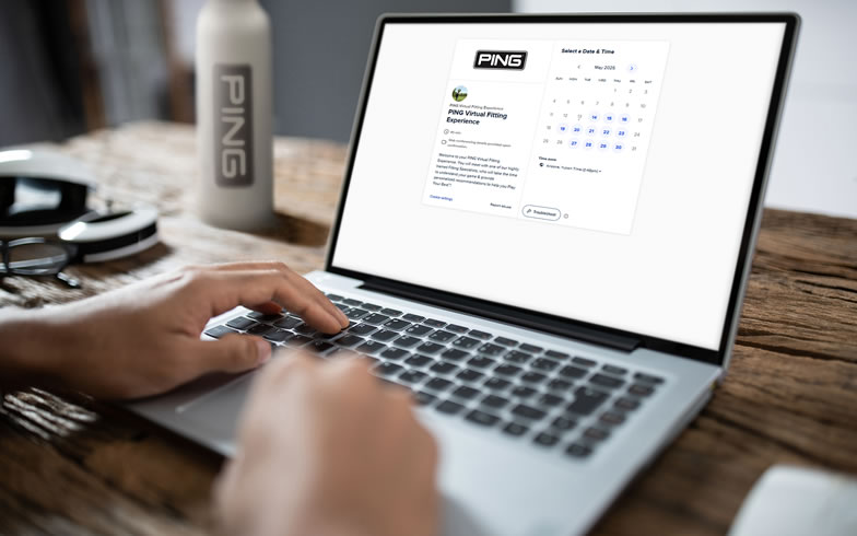 golfer using appointment scheduling website on laptop computer