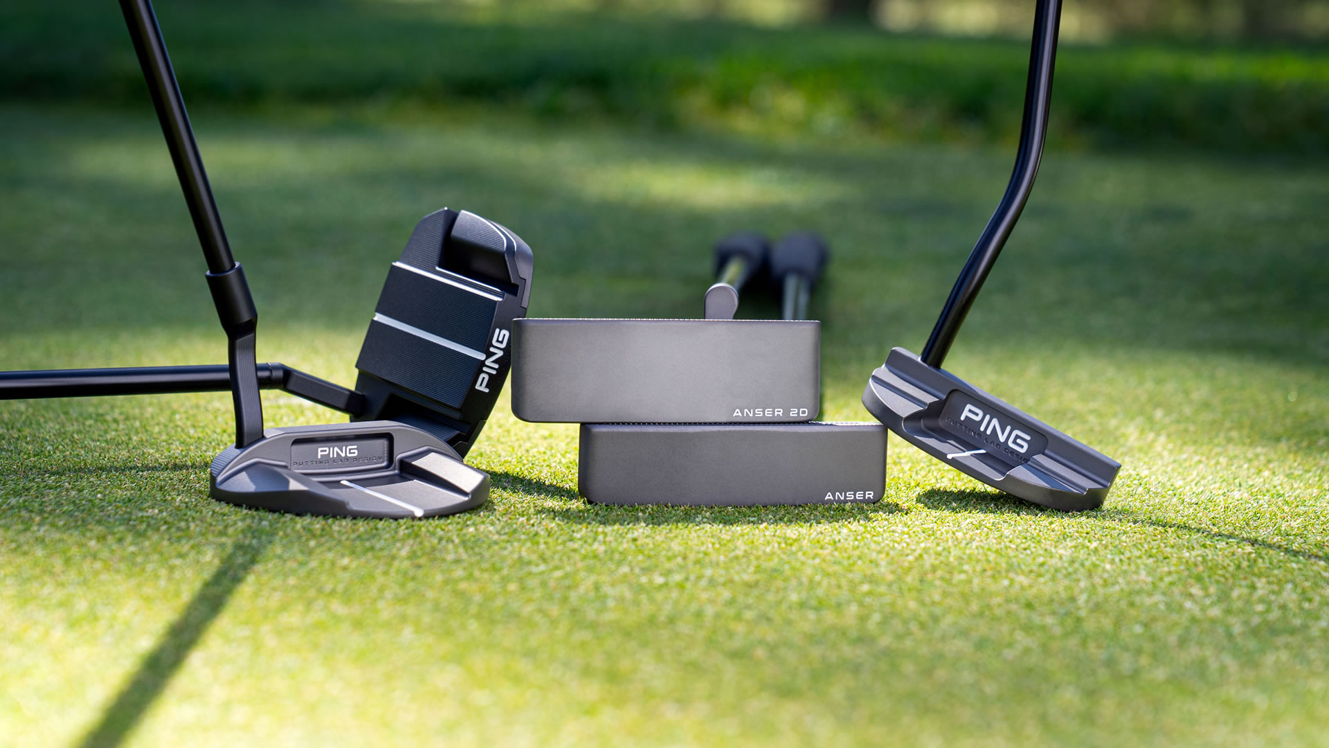 PLD Milled putters on putting green